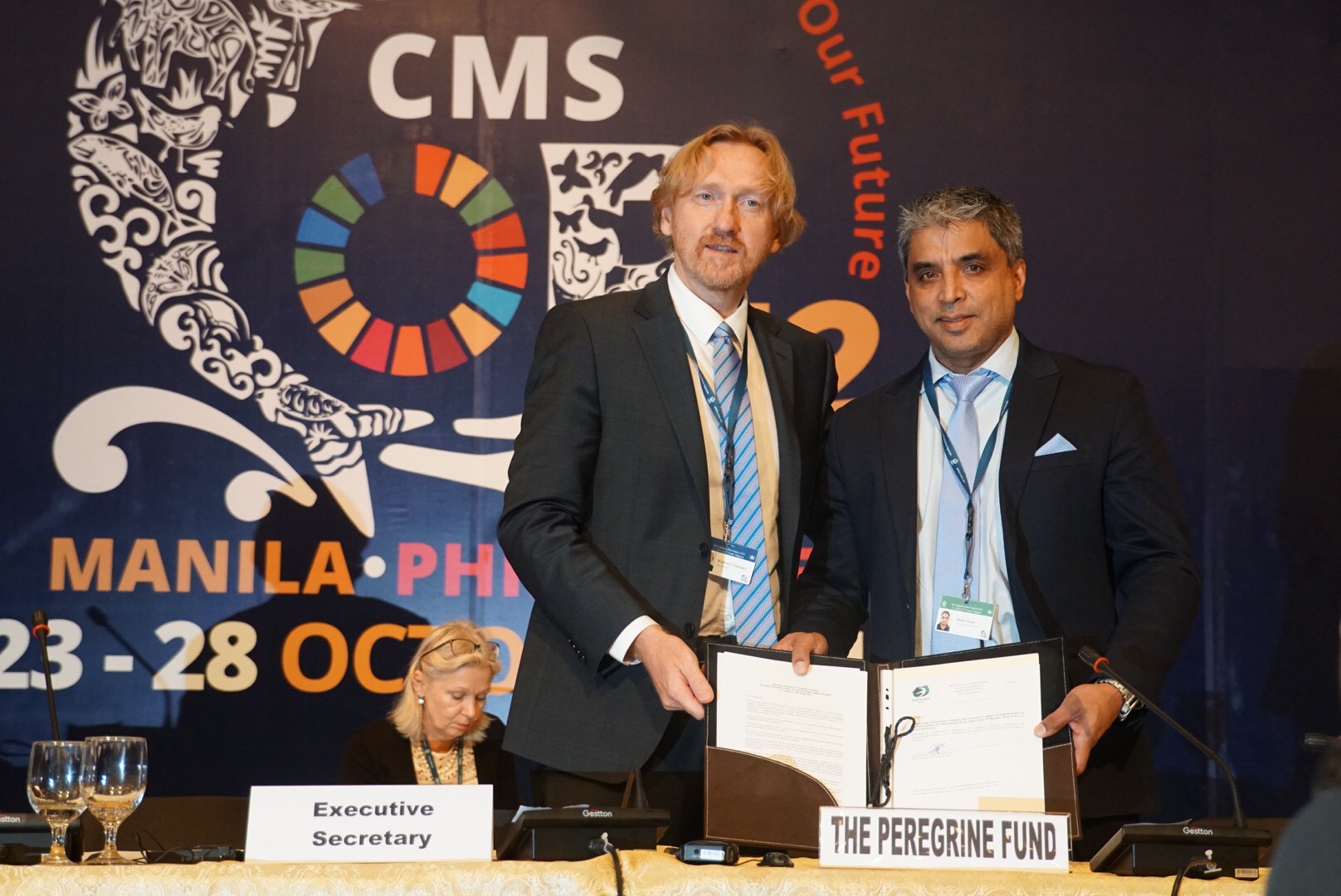 Dr. Munir Virani from the Peregrine Fund presenting the signed Raptors MOU © Aydin Bahramlouian